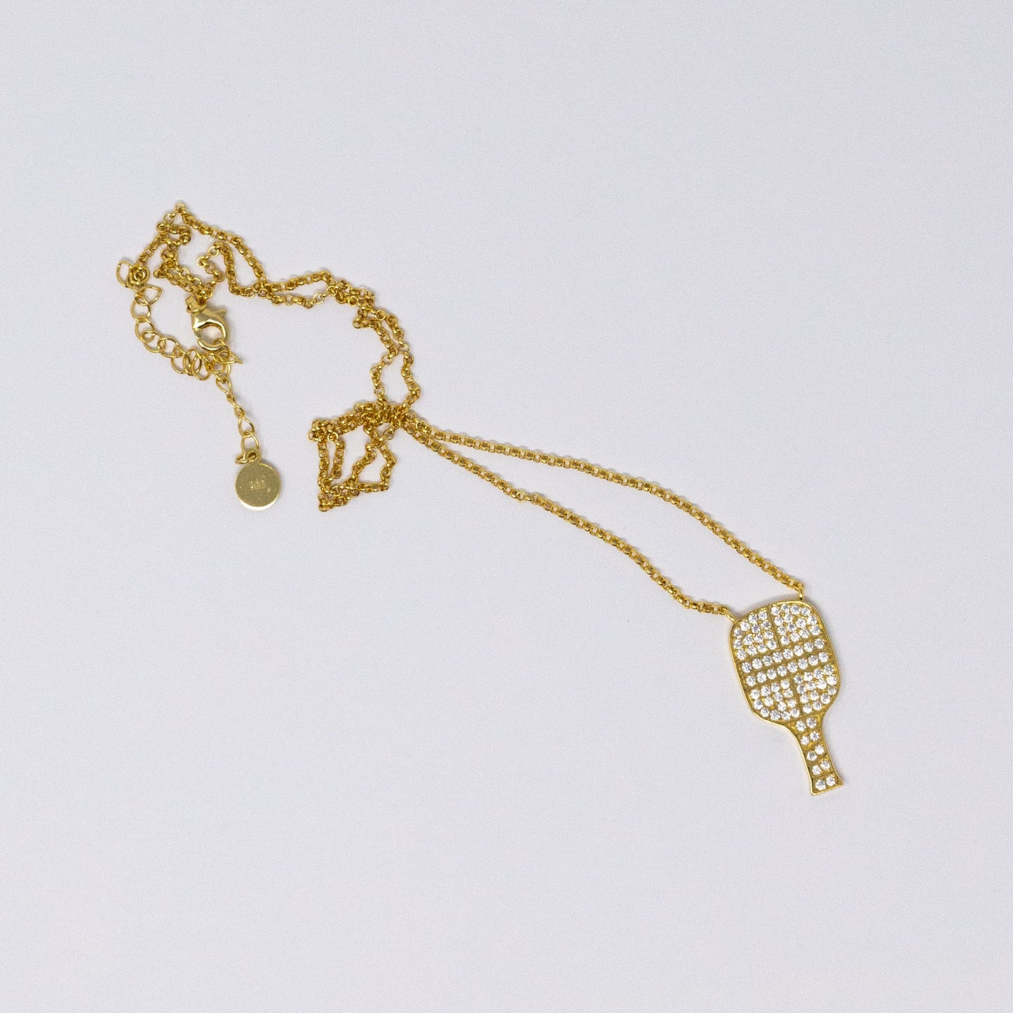 Gold Pickleball pendant with Cubic Zircoin by Mayfair Jewellers