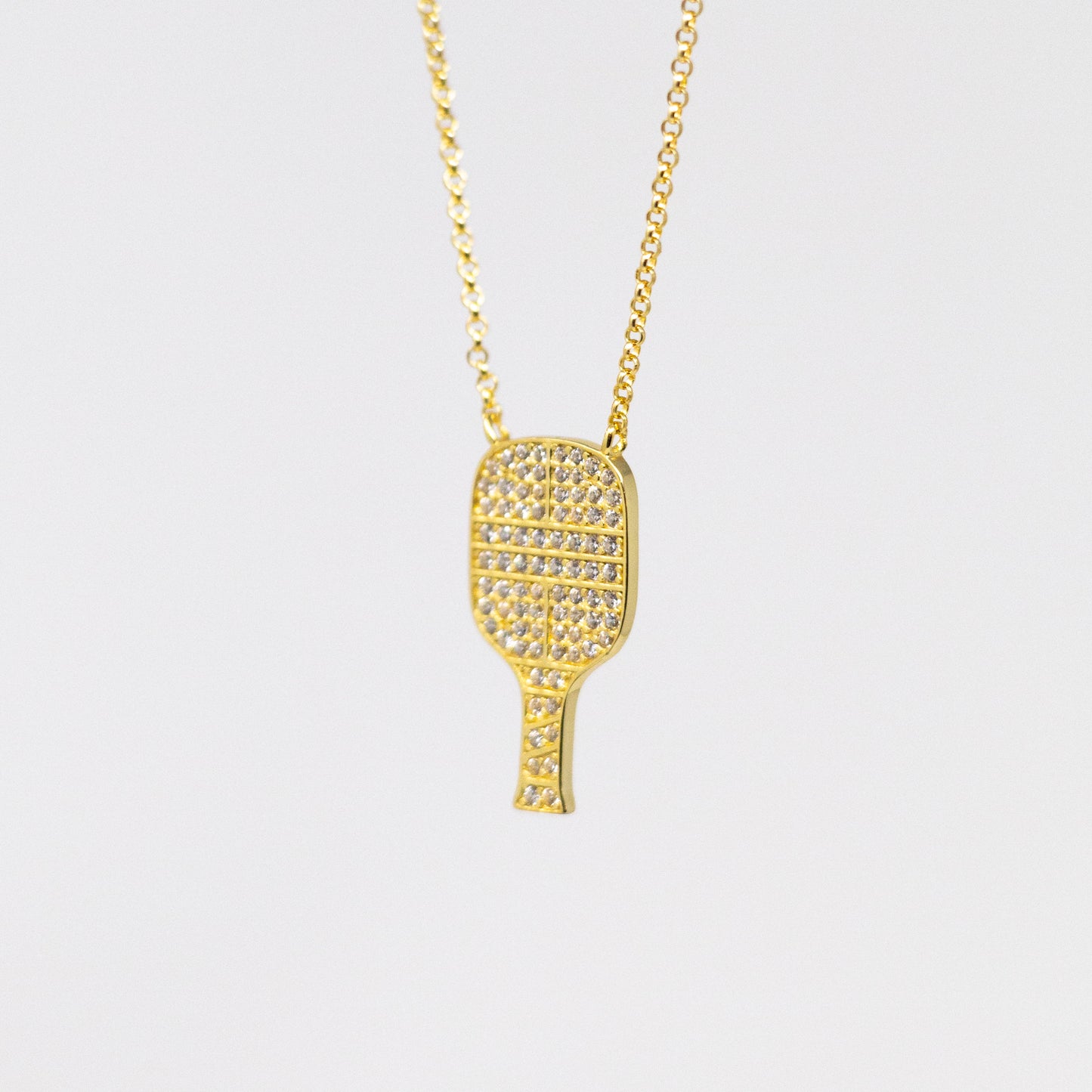 Gold Pickleball pendant with Cubic Zircoin by Mayfair Jewellers