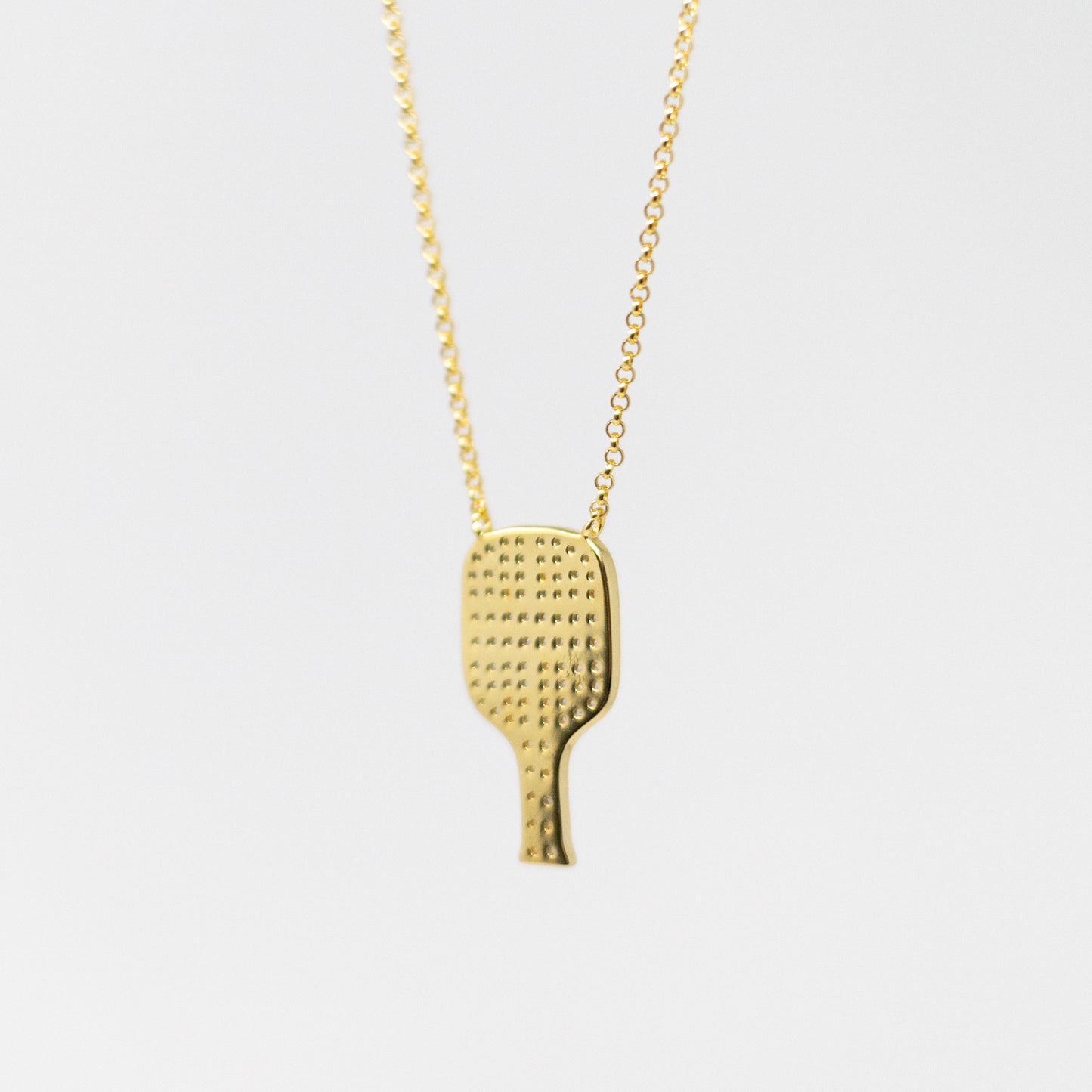 Gold Pickleball pendant with Cubic Zircoin by Mayfair Jewellers